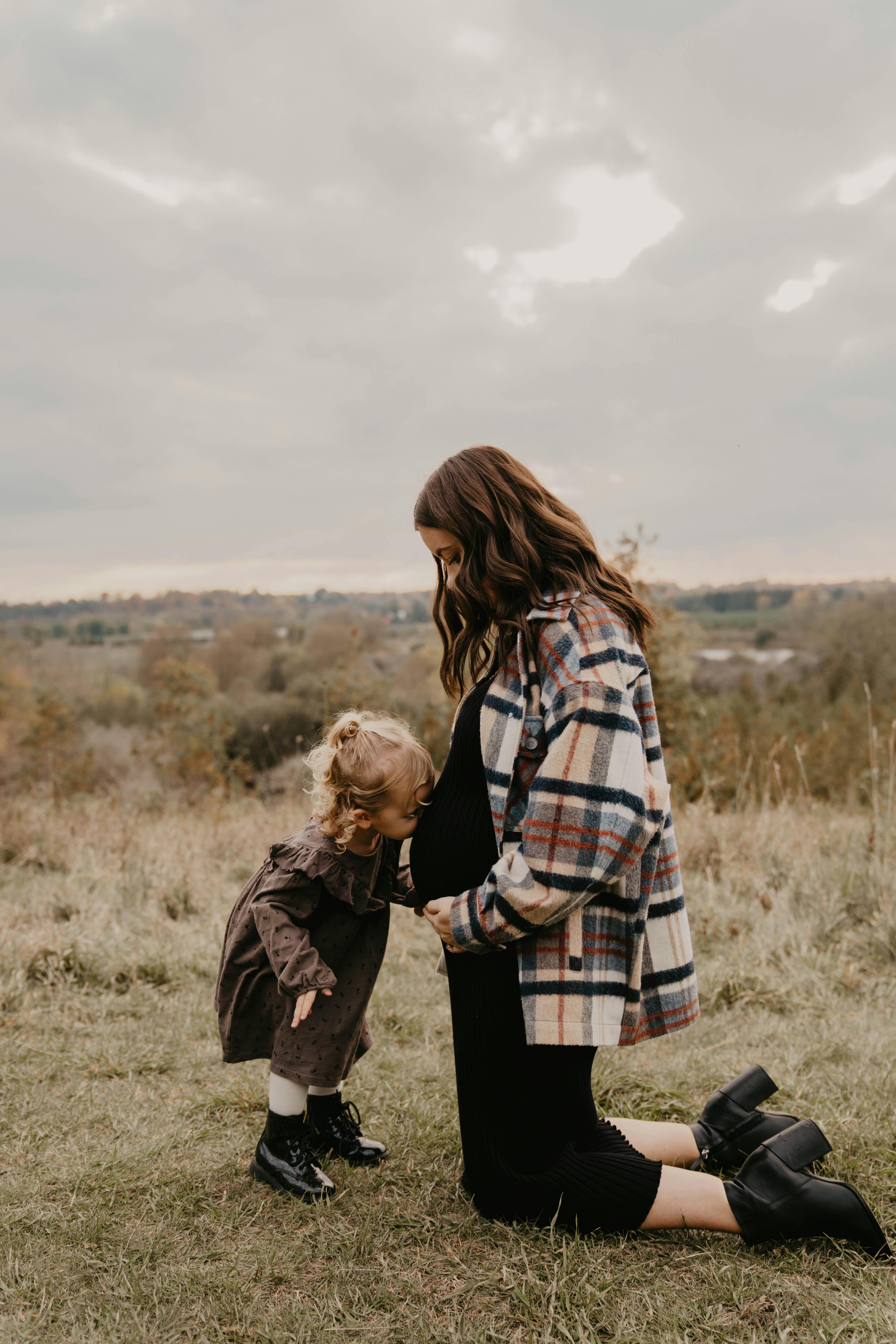 pregnant woman and child