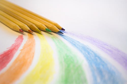 Close Up of a Colored Pencil Drawing a Colorful Rainbow Stock