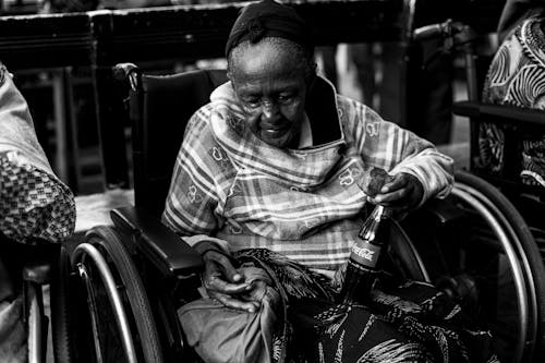 An Elderly Woman in a Wheelchair