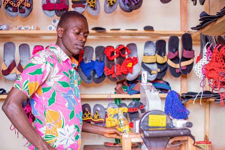 A Man Inside A Shoe Shop