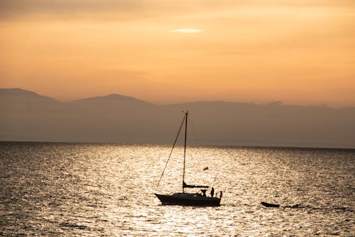 Photos gratuites de aube, bateau, coucher de soleil
