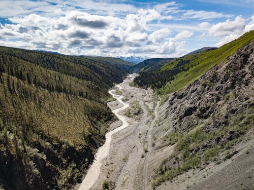 Drone Photography of Valley under Cloudy Sky 