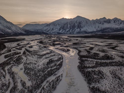 Безкоштовне стокове фото на тему «Аерофотозйомка, гори, замерзле озеро»