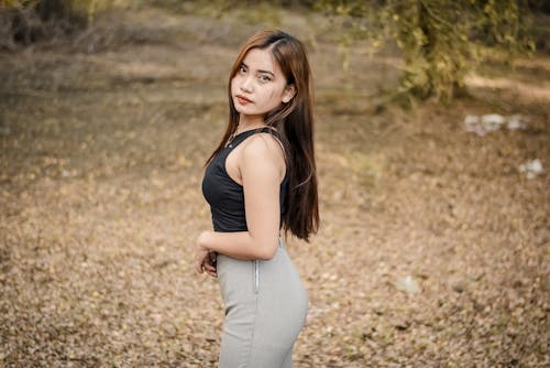 Beautiful Young Woman in Black Tank Top 