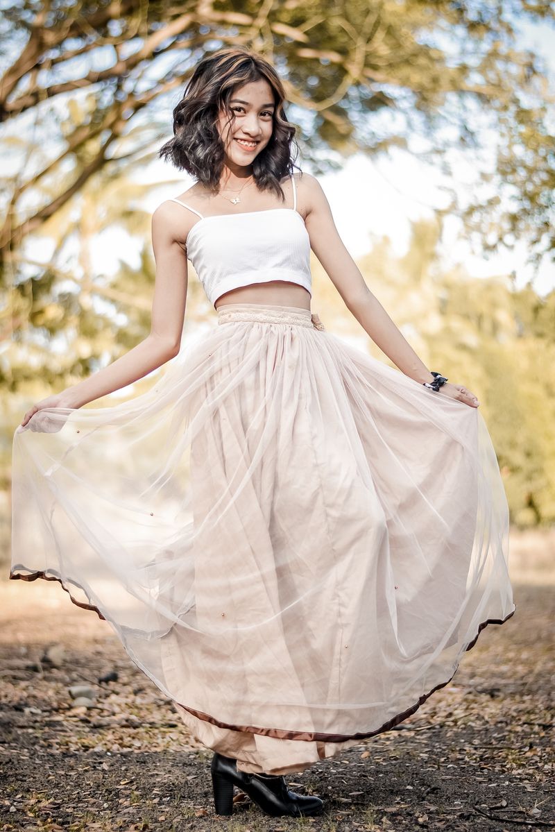 Woman wearing a flowy maxi skirt with a casual top