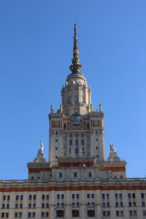 Free The iconic tower of Moscow State University against a bright blue sky. Architectural grandeur in Russia. Stock Photo