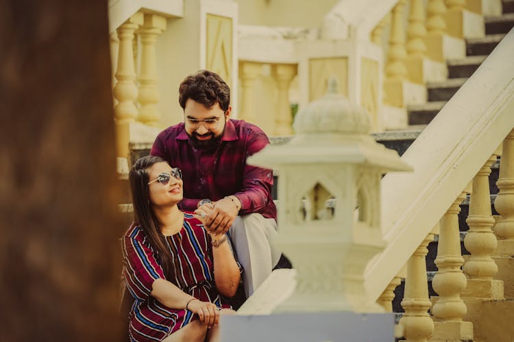 Couple Sitting Together On Steps