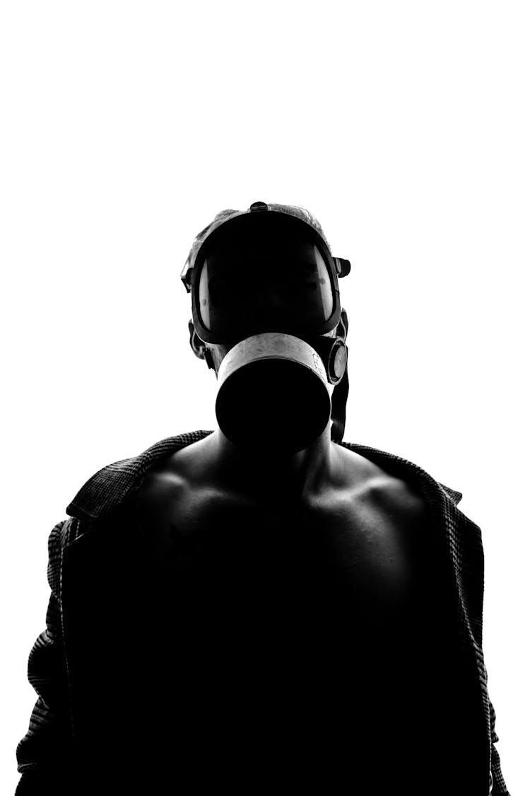 A Person Wearing A Gas Mask