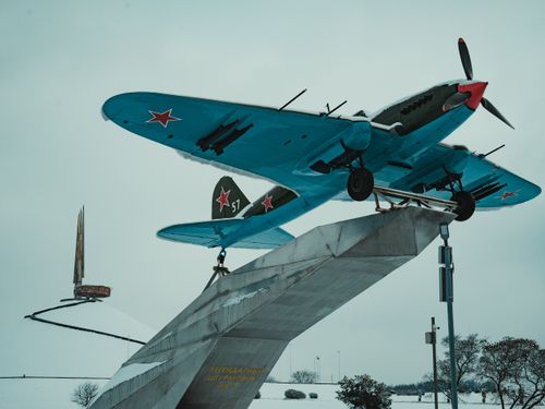 Free A Soviet military airplane monument covered in snow, symbolizing history and winter essence. Stock Photo