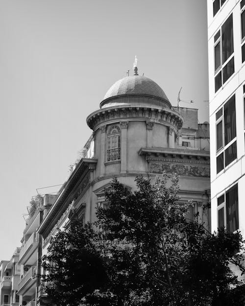 Grayscale Photo of Concrete Building