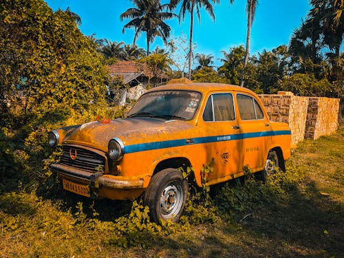 Free Abandoned Yellow Vintage Car Stock Photo