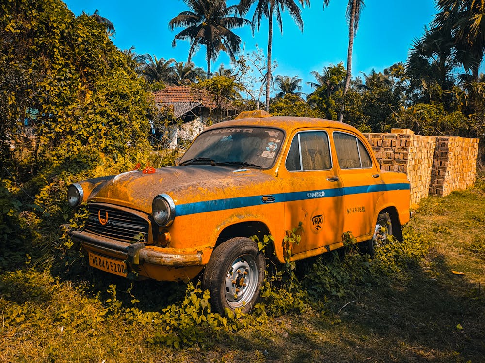 Free Abandoned Yellow Vintage Car Stock Photo
