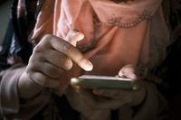 Close-up of hands using a smartphone, photo by Towfiqu barbhuiya on Pexels