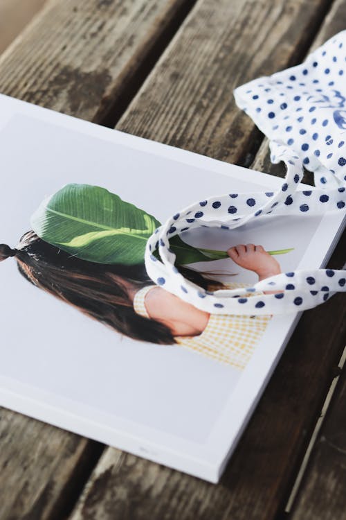 Drawing of Girl Holding Leaf