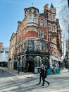 People Walking Outside the Bloomsbury Tavern