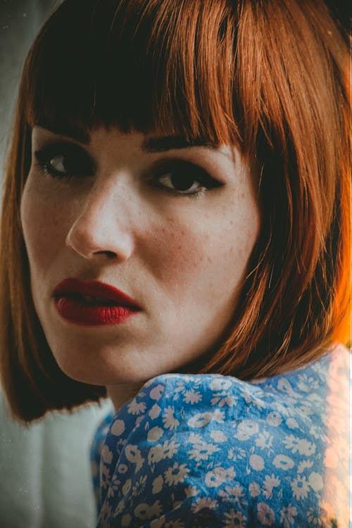 A Beautiful Woman in a Floral Shirt