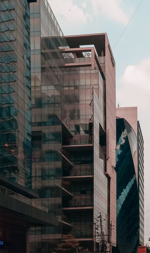 Free Contemporary architectural design of high-rise buildings in Dhaka, showcasing urban development. Stock Photo