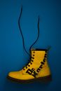 Unpaired Yellow Dr. Martens Lace-up Boot
