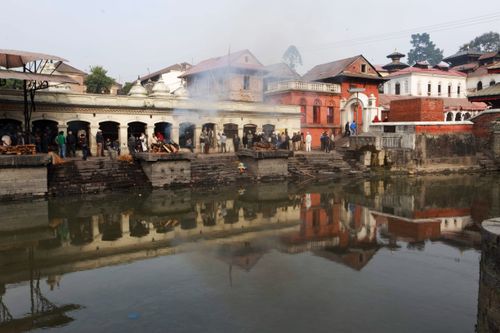 Free A busy ghat with rituals at Pashupatinath Temple by the Bagmati River. Stock Photo