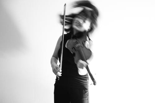 Woman Playing Violin in Grayscale Photography