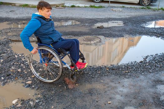 Woman on Wheelchair on Street