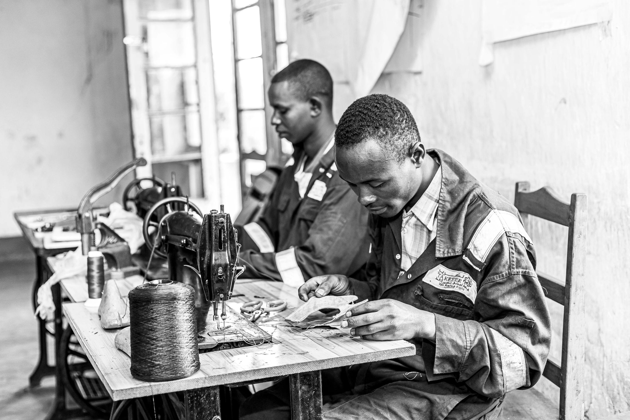 African seamsters working in a small business workshop