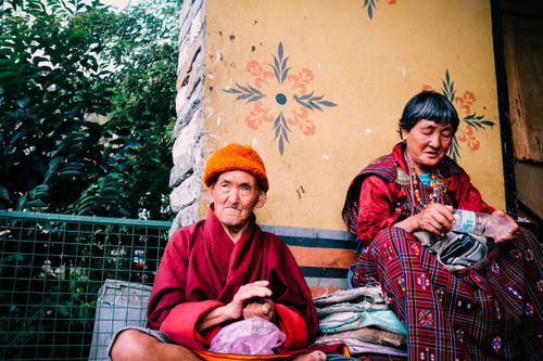 Elderly Women with Prayer Beads in Traditional Attire · Free Stock Photo