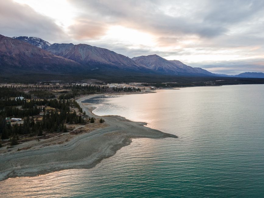 Juneau Shore Excursion: Helicopter Tour and Guided Icefield Walk - Aerial shot of a serene lakeshore in Canada's Yukon, showcasing natural beauty and tranquility.