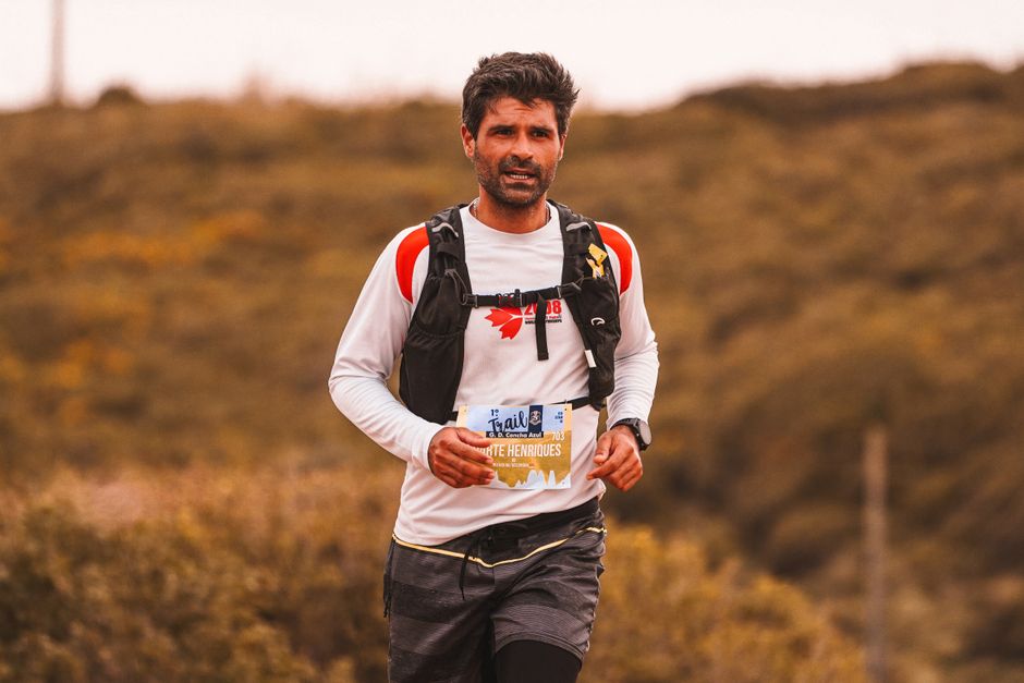 Trail runner navigating a technical rocky descent with stable foot placement Trail runner navigating a technical rocky descent with stable foot placement