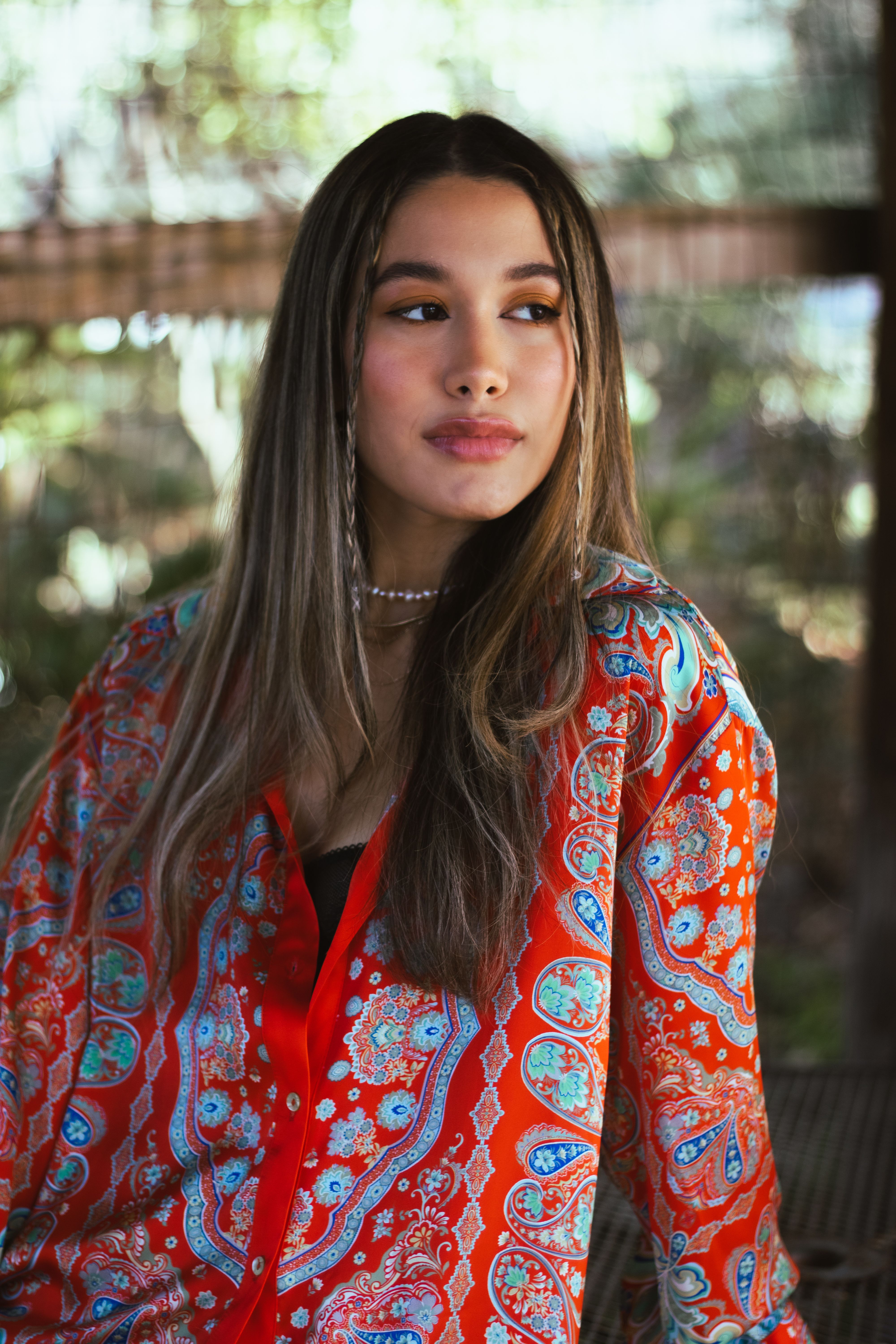 Woman in Red and Blue Floral Long Sleeve Shirt · Free Stock Photo