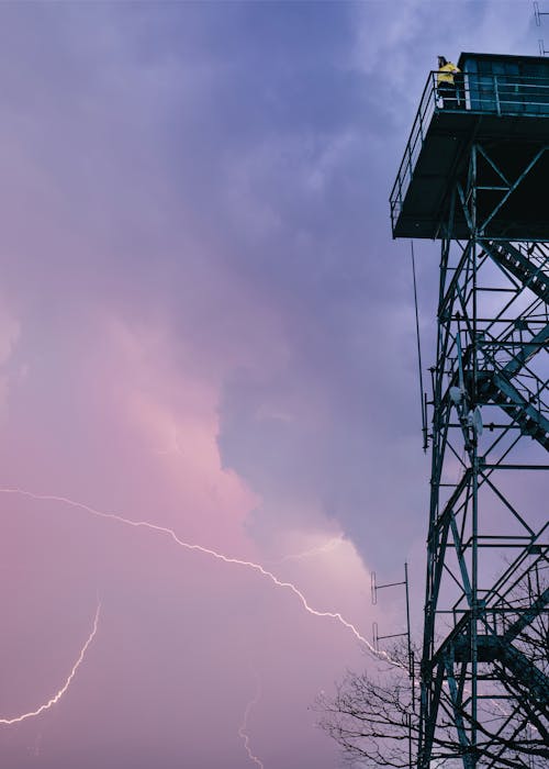 Lightning Strike beside a Steel Tower 