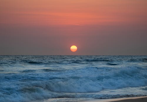 Scenic View of Sunset at the Beach