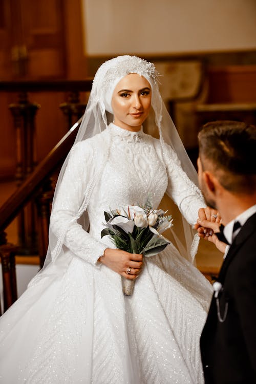 A Beautiful Bride Holding a Bouquet
