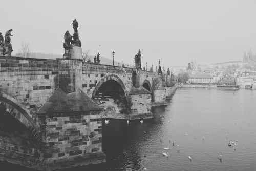 Free Black and white view of Charles Bridge over Vltava River in Prague. Stock Photo
