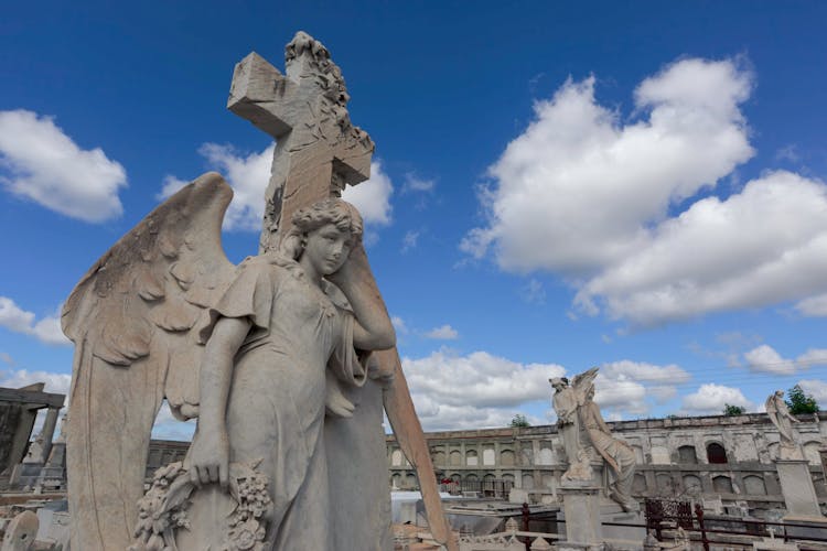 Catholic Statues With Cross And Angel