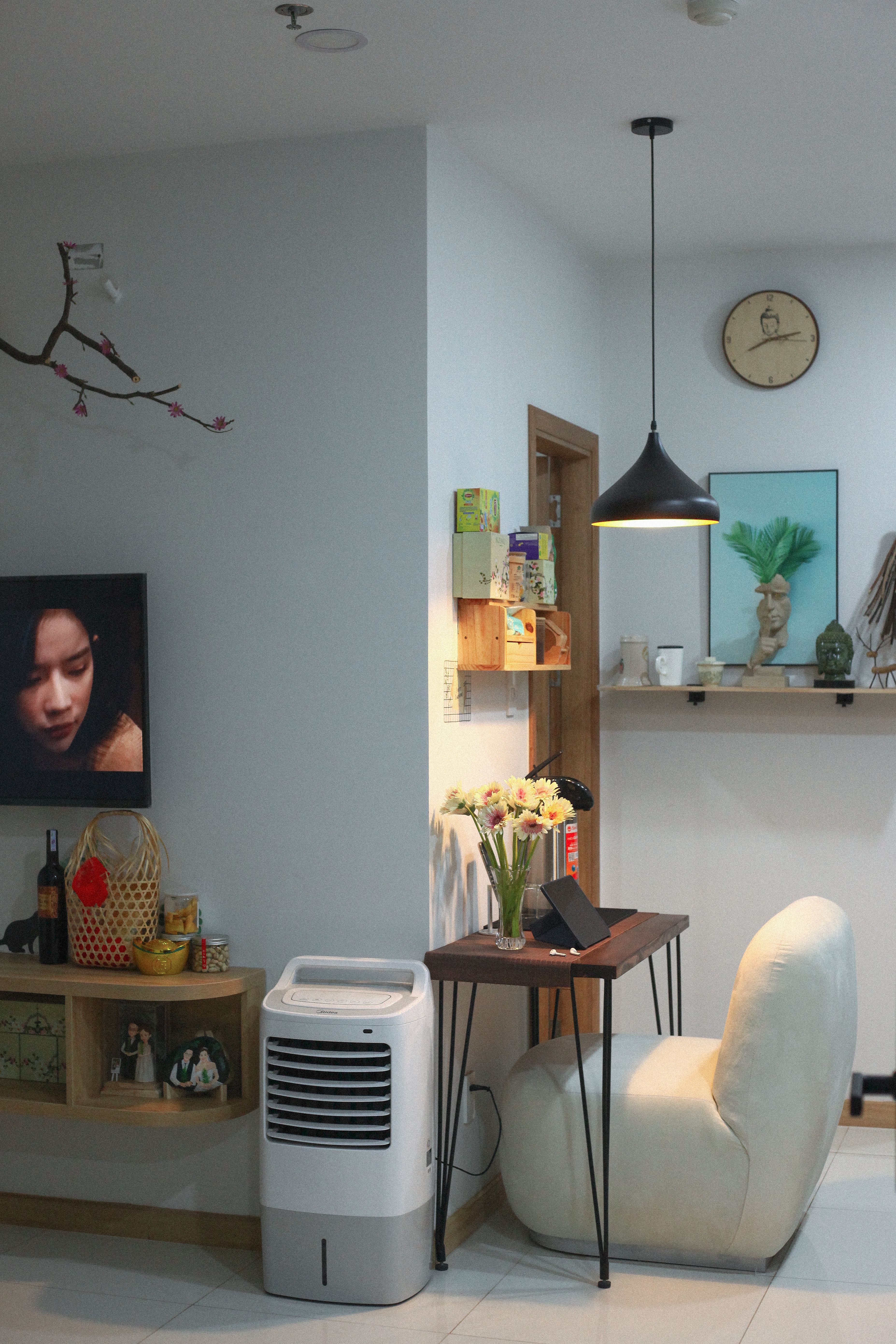 A stylish home interior featuring a chair, desk, and decor elements to enhance cozy living.