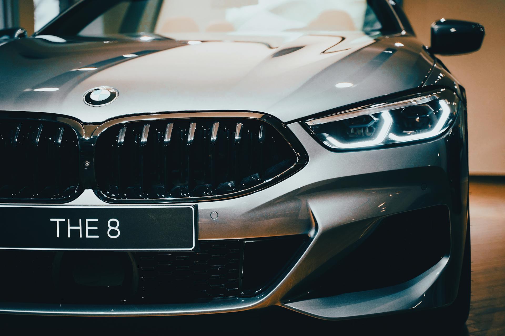 Close-up shot of BMW 8 Series showcasing sleek design and luxury features