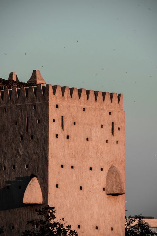 Free Close-up of traditional Arabian architecture in Dubai during sunset, showcasing unique facade design. Stock Photo