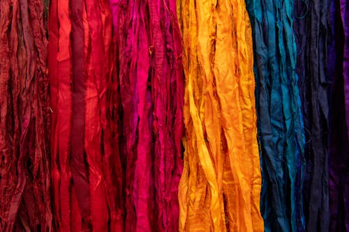 Free Close-up Photo of Assorted Colored Fabrics  Stock Photo