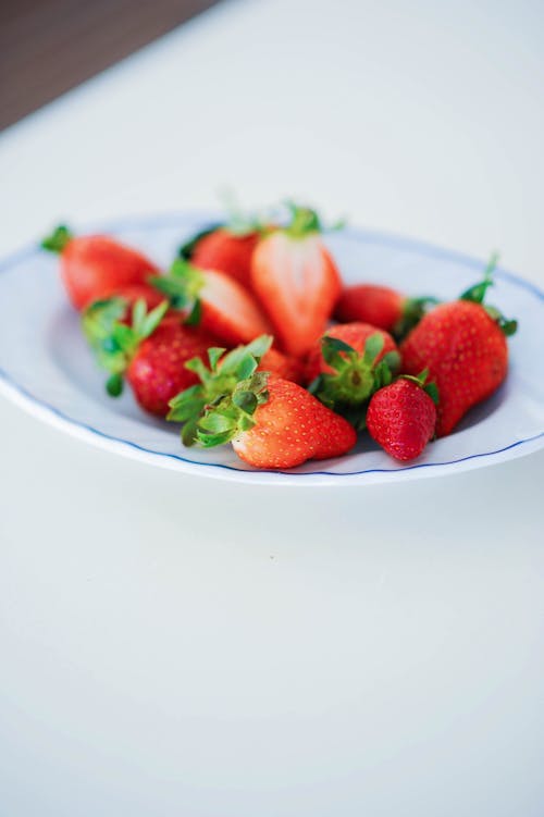 A Plate Filled with Delicious Strawberries 
