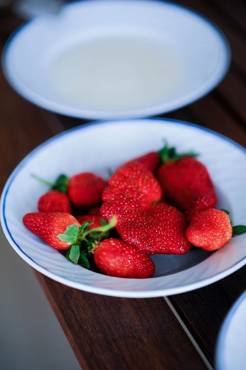 A Plate Filled with Delicious Strawberries in Close-up Shot
