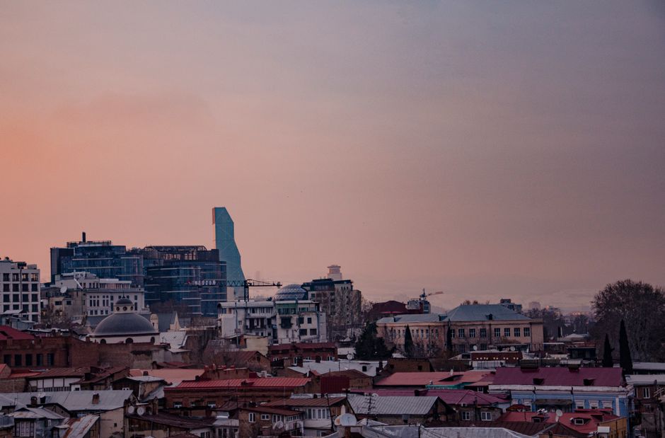 Conakry - Vibrant city street with local shops and cafes