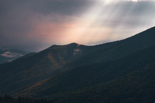 Aerial View of Gray Clouds over a Mountain Range · Free Stock Photo