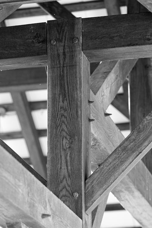 Grayscale Photo of Wooden Corner Braces