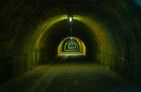 Tunnel With Light Turned on during Night Time