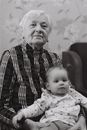 Grandma Holding Baby on Her Lap