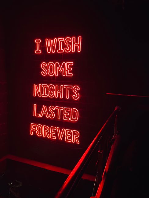 Vibrant red neon sign with a nostalgic message, perfect for urban and night-themed projects.