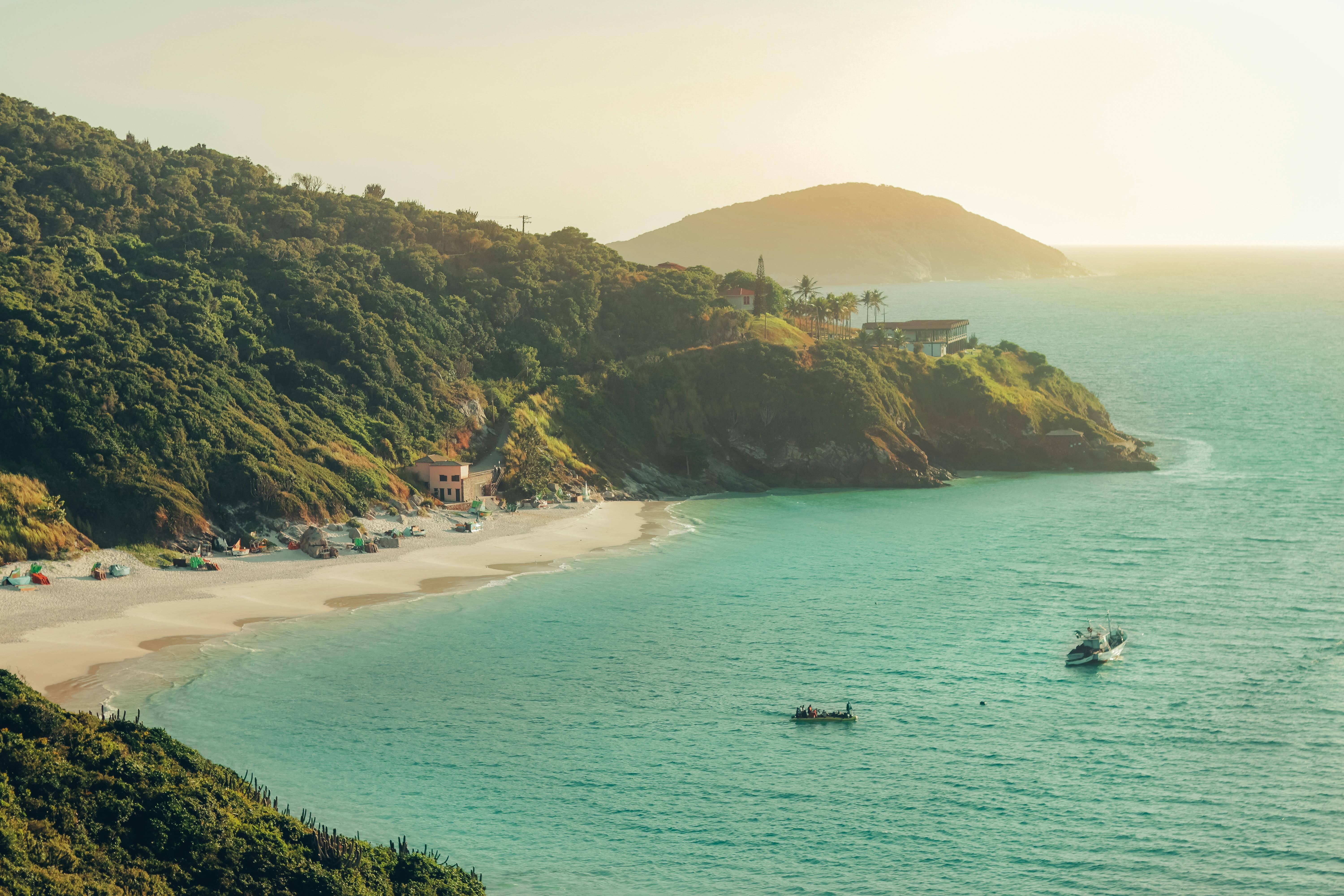 Aerial Photography of a Beach Near Mountains · Free Stock Photo