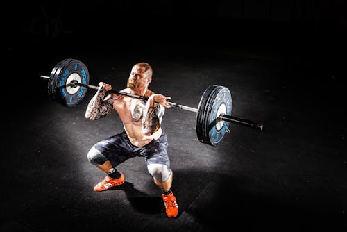 Man Lifting a Barbell