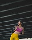 Brunette Woman Model in Top and Pants in Contrasting Colours